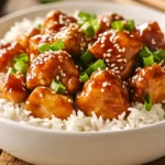 Slow cooker honey garlic chicken served on rice